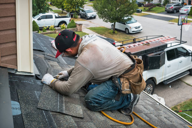 Professional Storm Damage Roof Repair technician working in Greenfield, IL